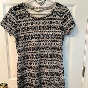 Never worn Pink Rose asymmetrical short sleeve dress  cap sleeves. Junior large